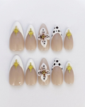 Uñas postizas de almendra con forma de estrella dálmata, talla mediana