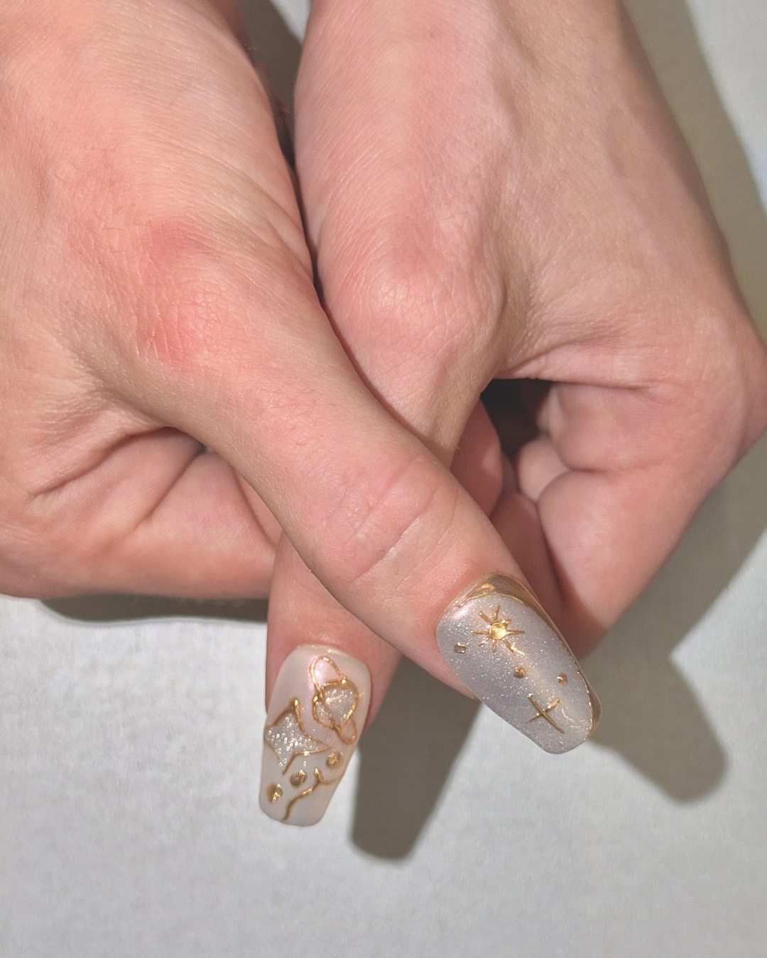 Pink silver chrome press ons long squoval worn on hands special look